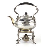 An early 20th century silver spirit kettle and stand of typical form, maker H&Co. Ltd., London 1915,