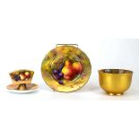 A Royal Worcester cabinet plate, d. 16 cm, a matching sugar bowl and stand, each decorated with ripe