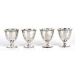 A set of four early 20th century silver eggcups, James Dixon, Sheffield 1918, overall 2.5 ozs (4)