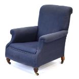 For Reupholstery: attributed to Howard & Sons, a late Victorian armchair with mahogany legs and