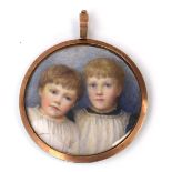 A 19th century miniature head and shoulders portrait depicting two young girls, within a circular