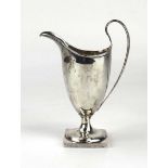 A Victorian silver cream jug of helmet form, maker GH RH, Chester 1897, h. 14.5 cm, 3.5 ozsCondition