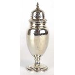 An early 20th century silver sugar sifter of ovoid form, maker B&F Ltd., London 1932, h. 17 cm, 3.