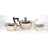 An early 20th century silver three piece tea service of typical form, Viners, Sheffield 1931,