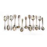 A group of twelve Georgian and later silver old English and fiddle pattern tea and mustard spoons,