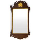 A George II-type wall mirror, the rectangular plate within a mahogany and giltwood fretwork frame,