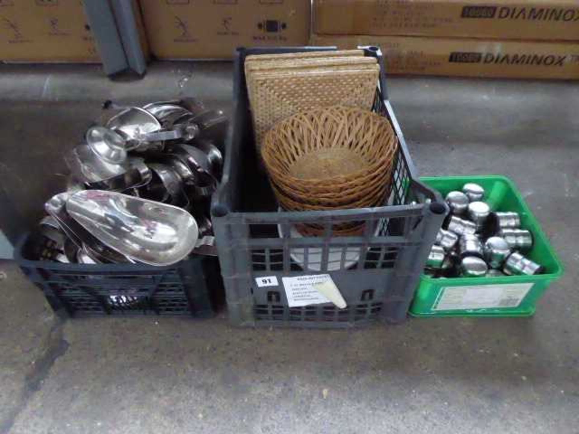 3 boxes containing stainless steel salt and pepper, gravy boats, bread baskets and placemats