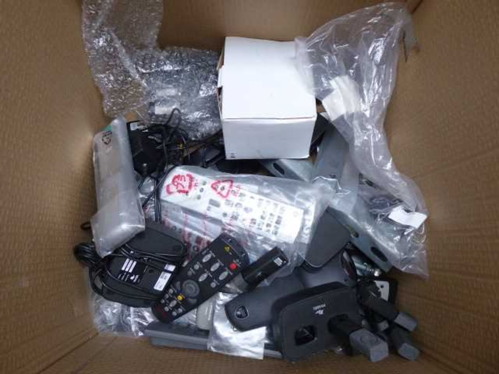 +VAT Large box containing assorted remote controls and other products to include Revo Labs, Eiki,