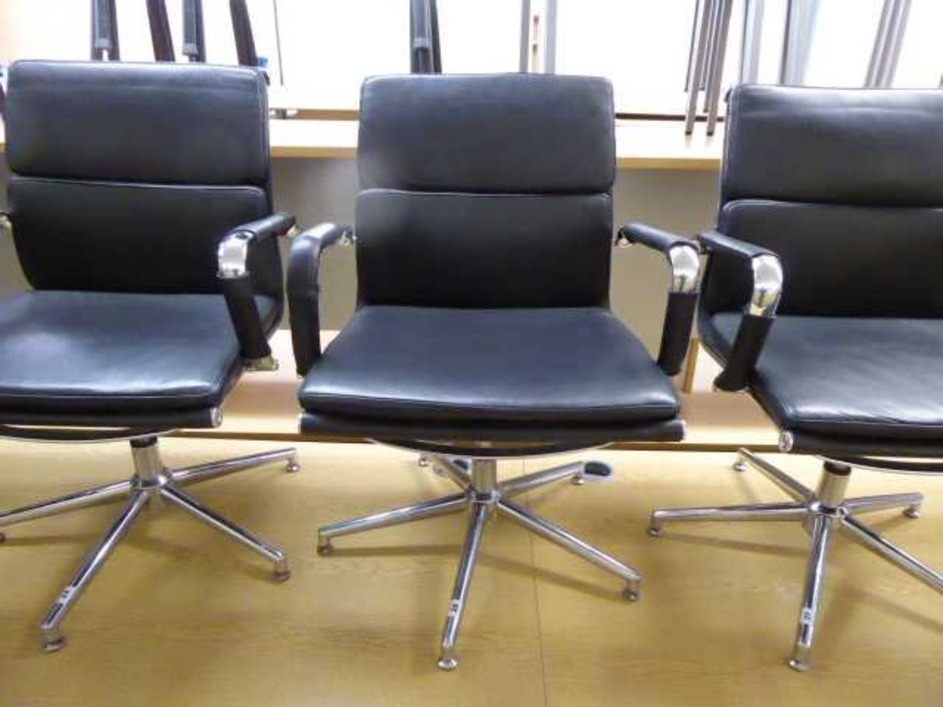 Eames style black soft pad swivel chair with chrome frame