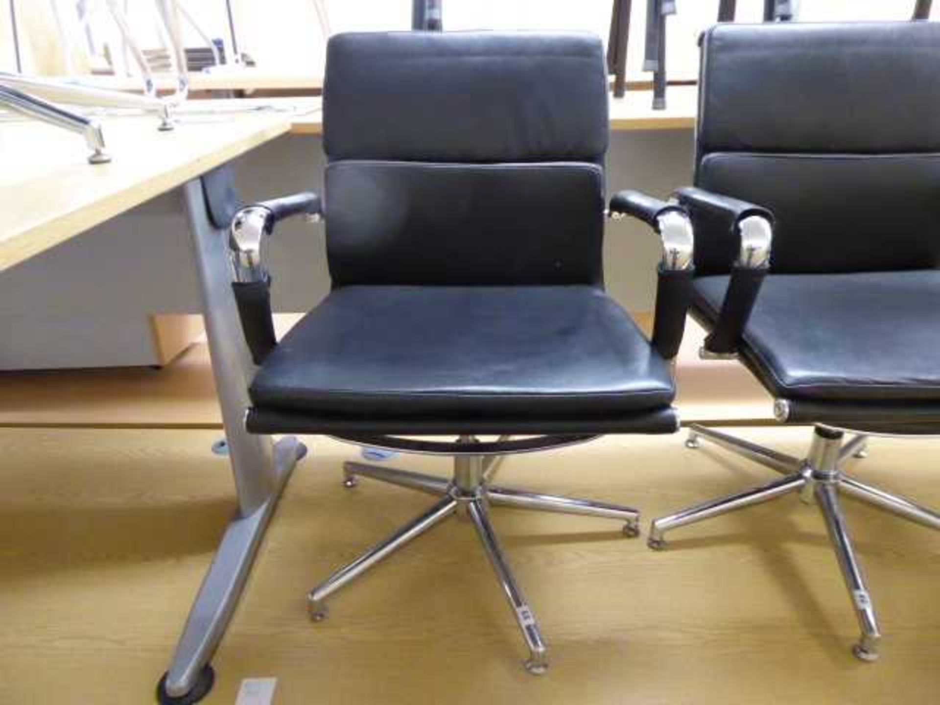 Eames style black soft pad swivel chair with chrome frame