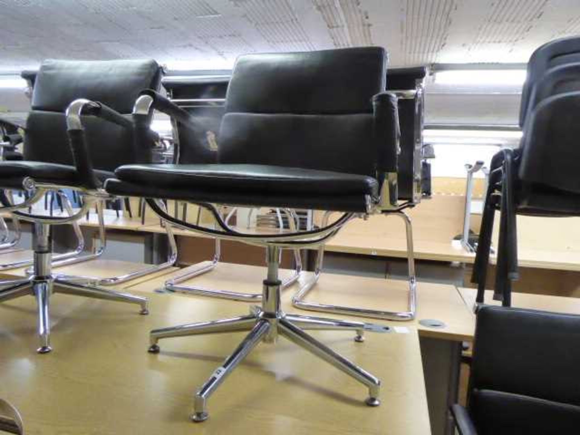 Eames style black soft pad swivel chair with chrome frame