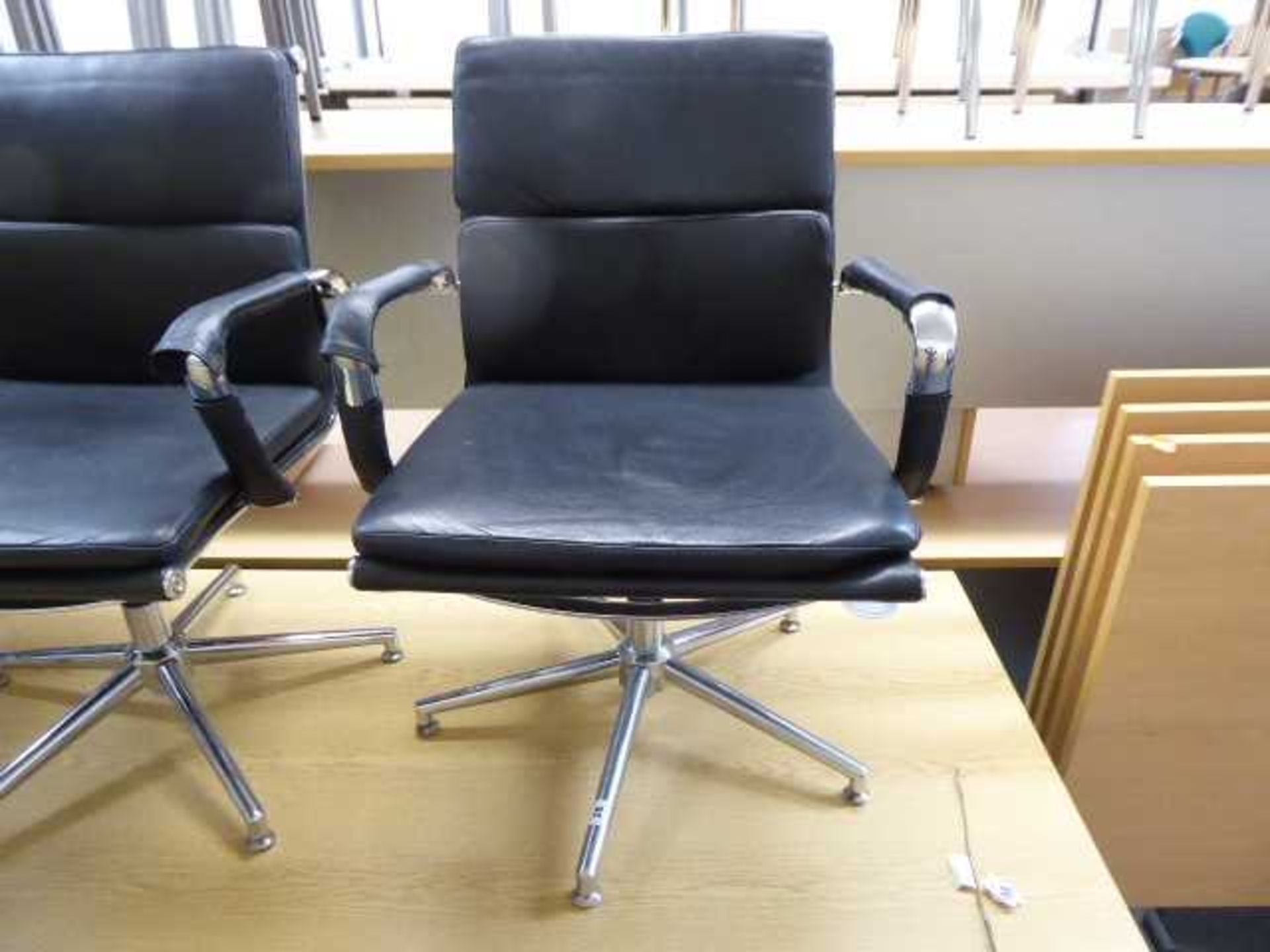 Eames style black soft pad swivel chair with chrome frame