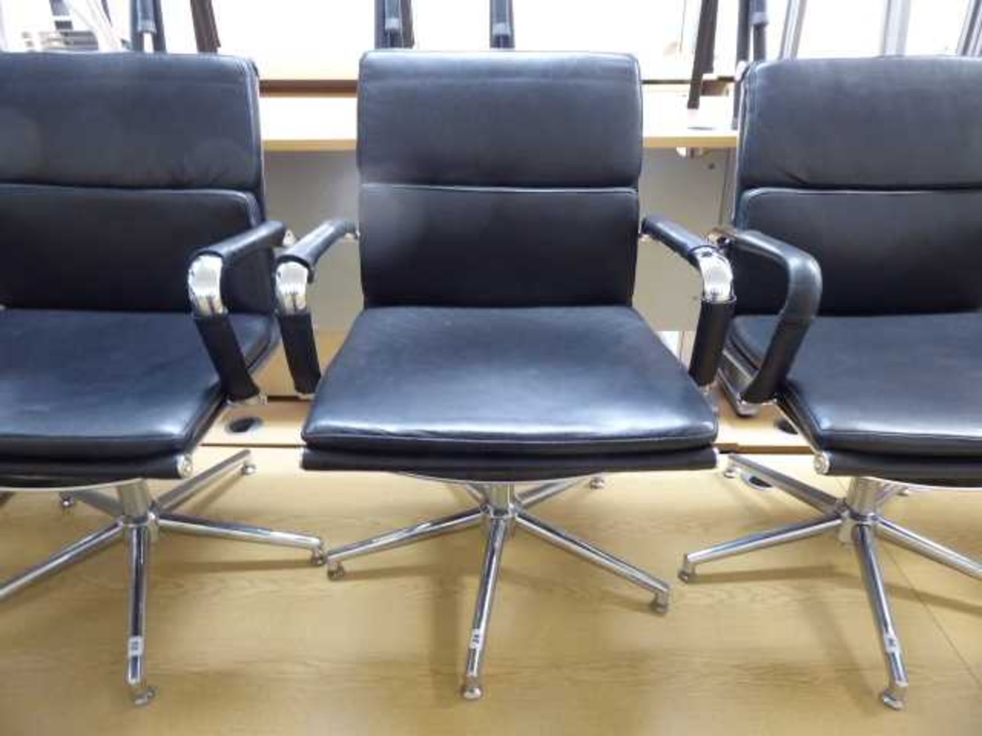 Eames style black soft pad swivel chair with chrome frame