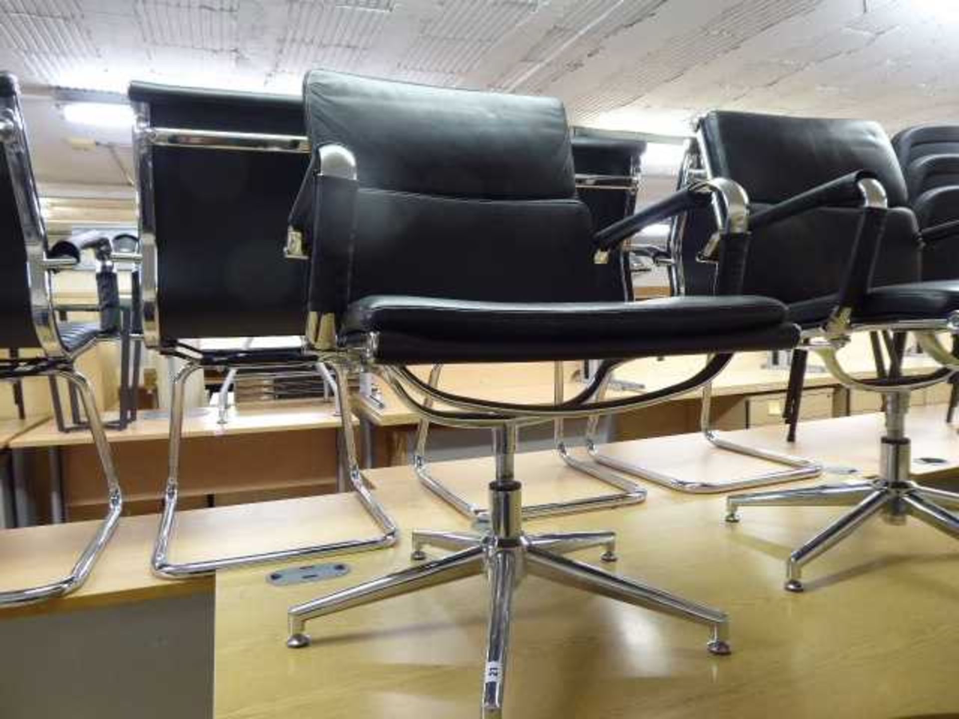 Eames style black soft pad swivel chair with chrome frame