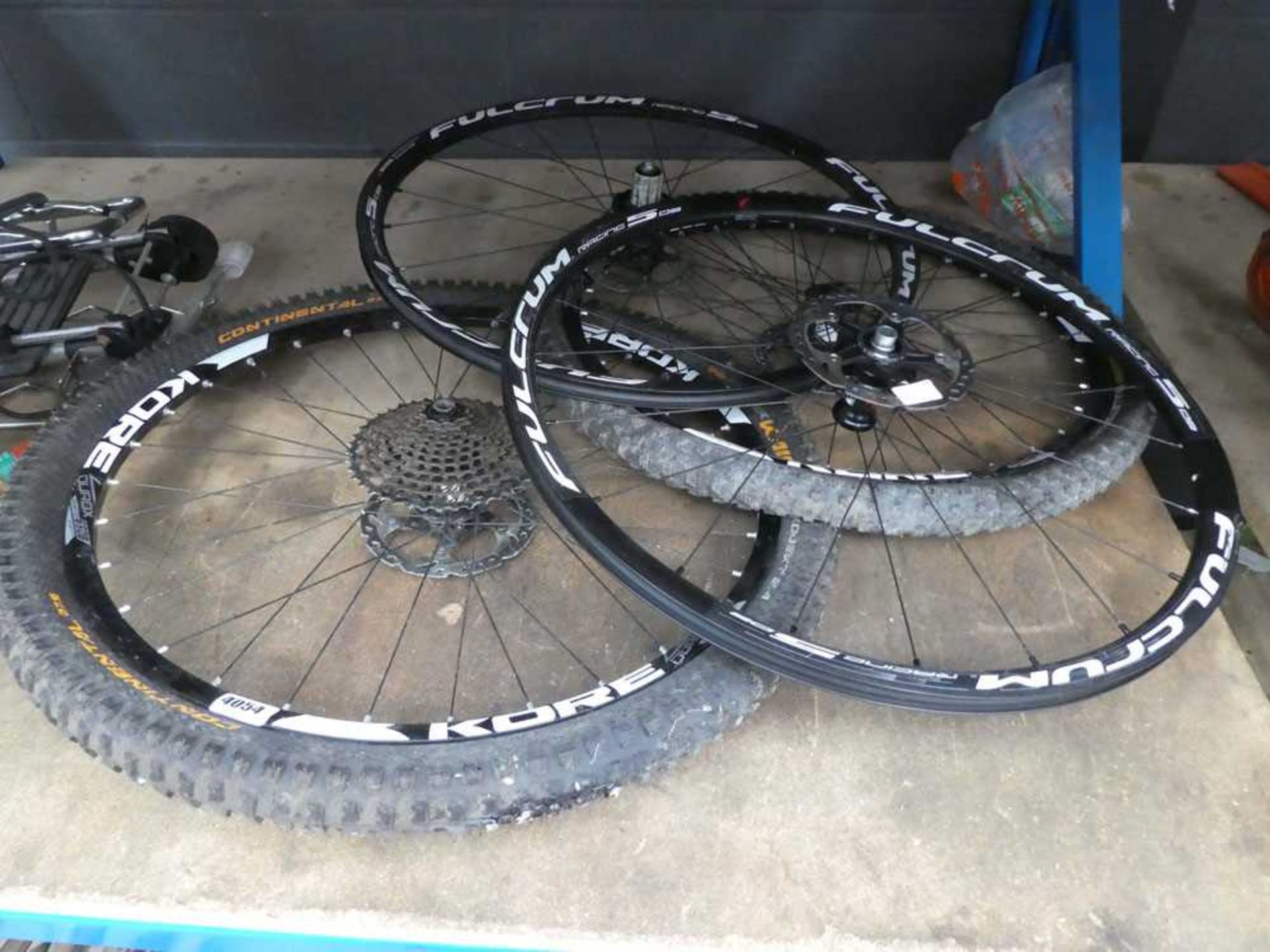 4 bike wheels and 2 tyres