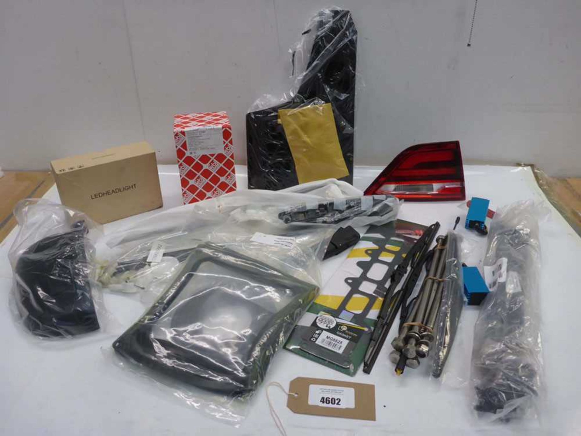 +VAT Car parts including Drive shaft joint kit, ramp hinge tube, rear light unit, mud flaps, gasket,