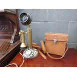 Brass candlestick telephone plus Range Meter in leather case