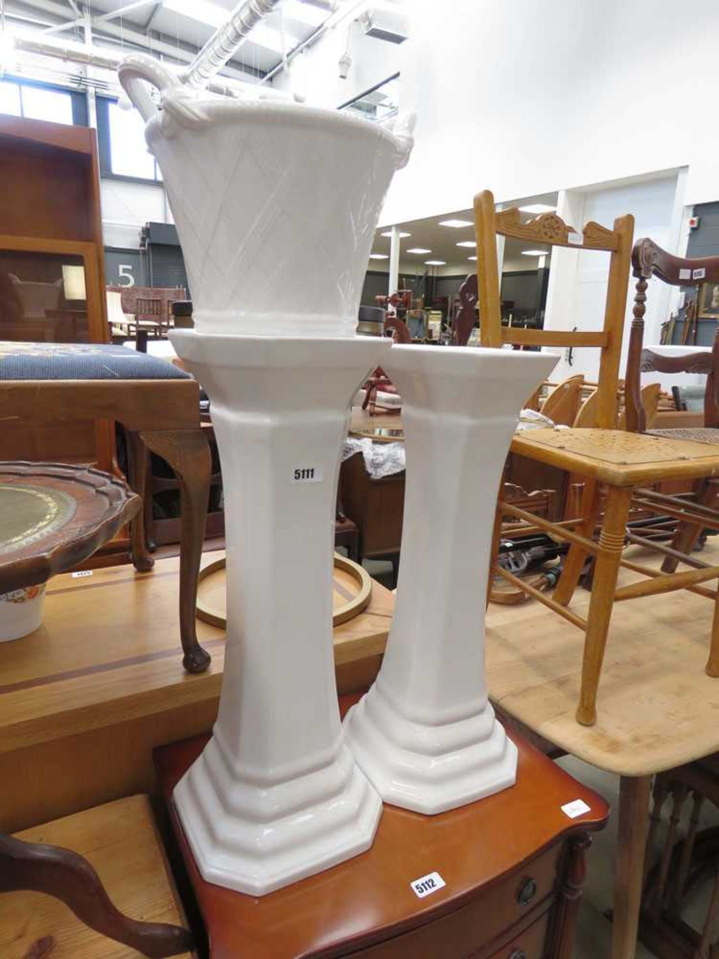 2 white glazed columns plus a single basket plantpot