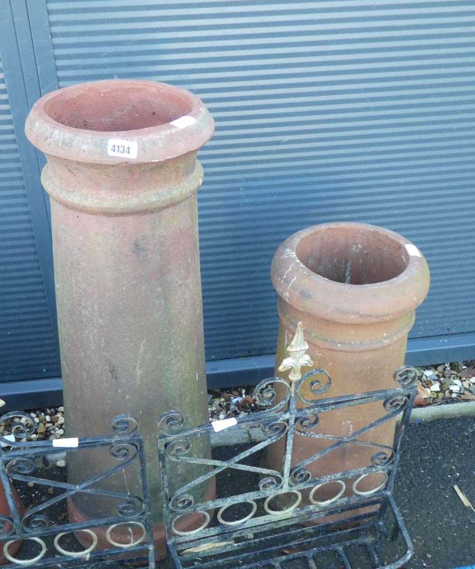 Large terracotta chimney pot and a medium sized terracotta pot