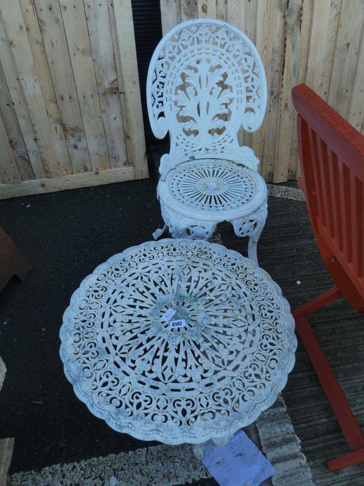 Small round garden table and one chair