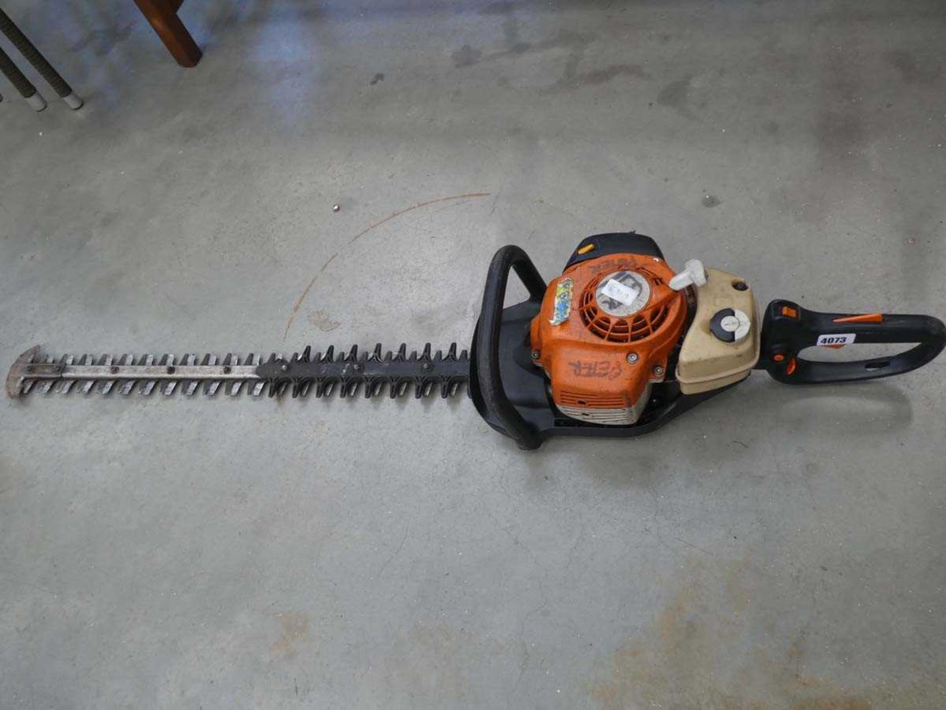 Stihl petrol powered hedge cutter