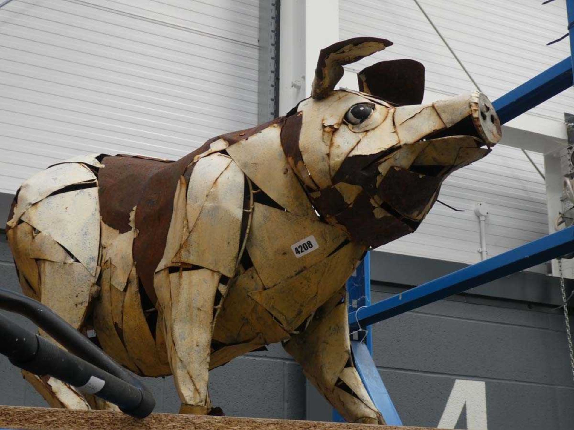Large metal work garden ornament of a pig