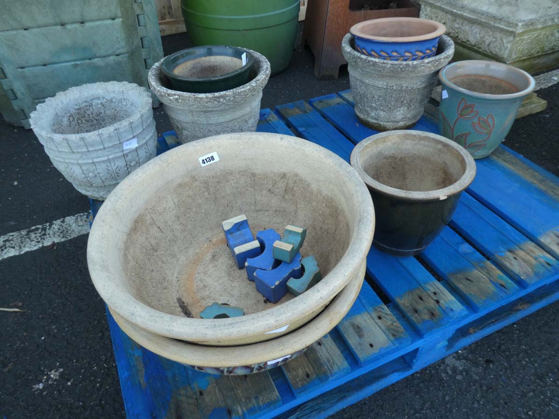 Pallet containing various garden pots