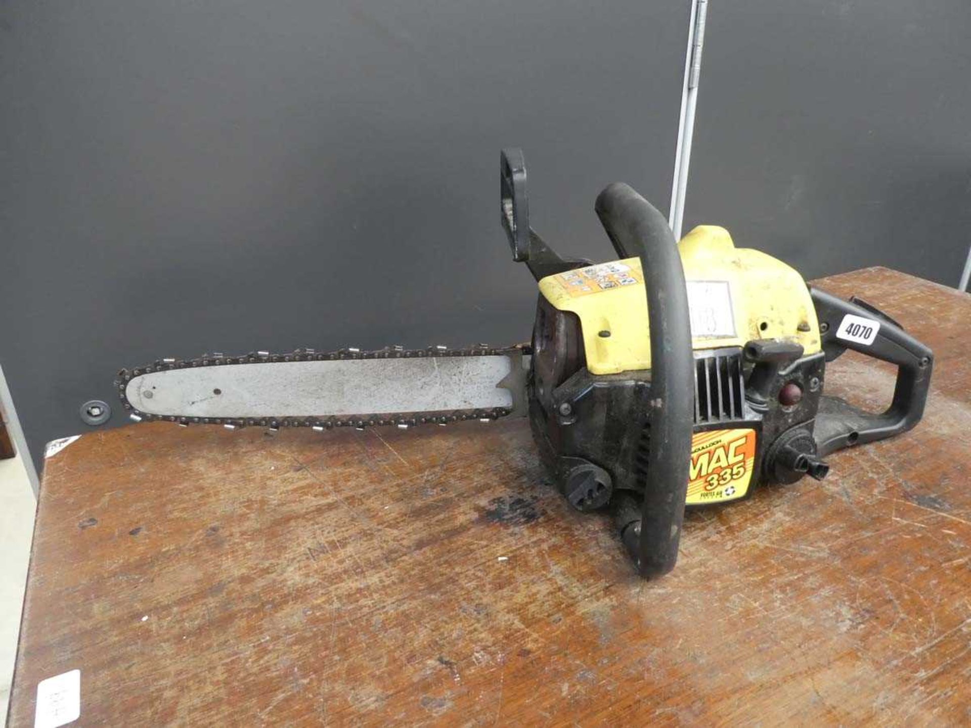 McCulloch 335 petrol powered chainsaw