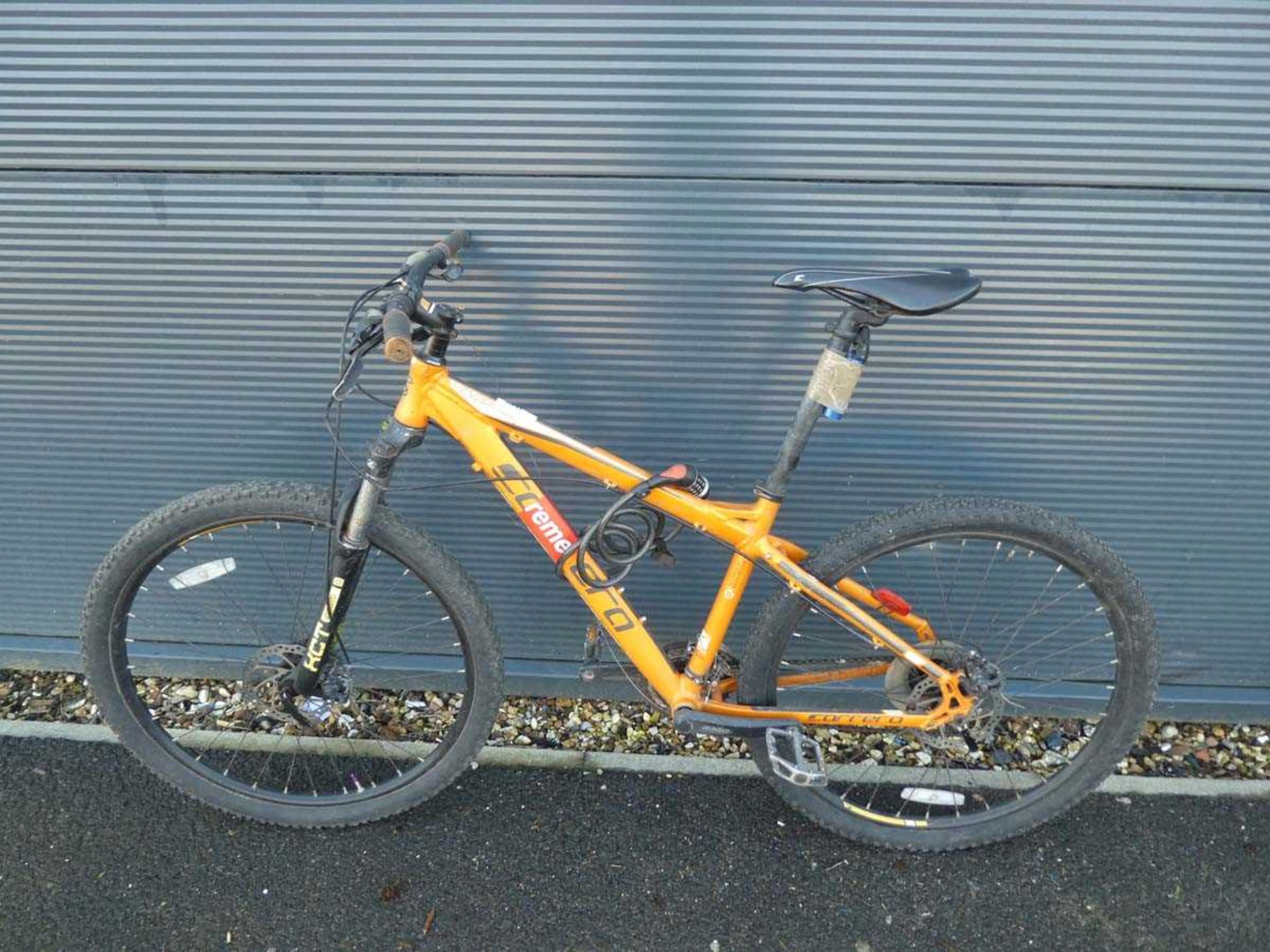 Orange and black Carrera gents mountain bike