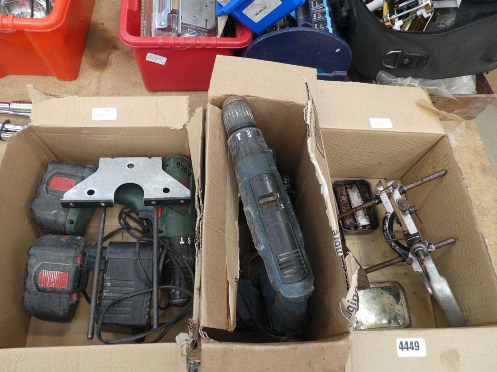 3 cardboard boxes containing 2 Bosch battery drills, small Stanley plane and 1 other
