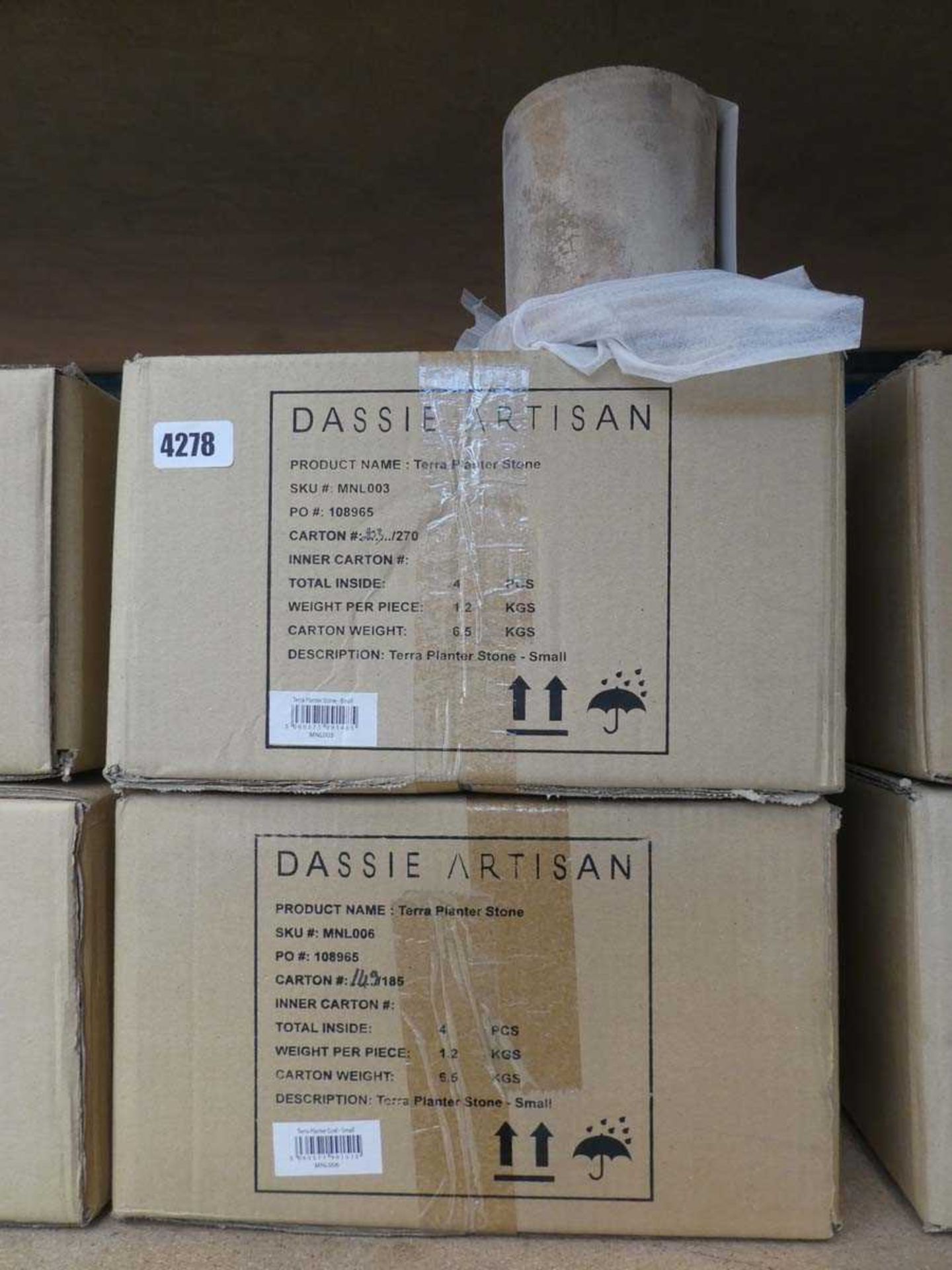 Two boxes of Dassie Artisan terra planter stone plant pots with four pots in a box