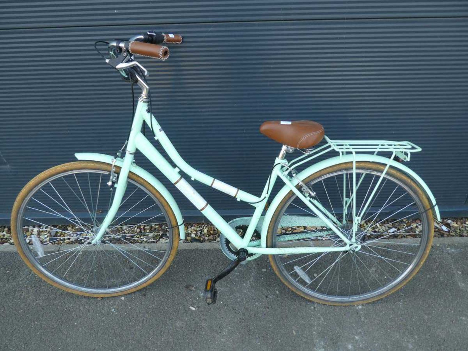 Cross light green and white ladies bike