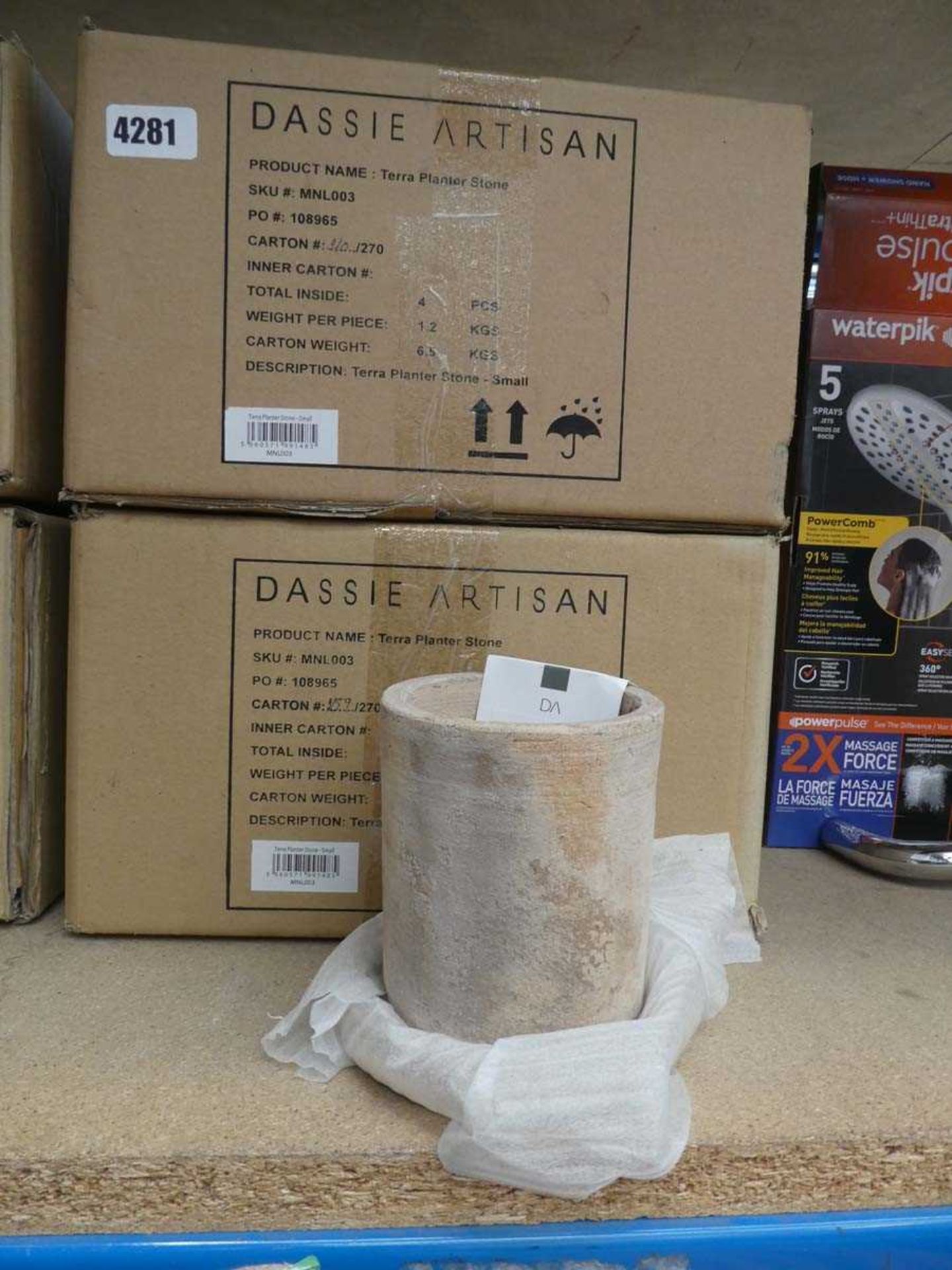 Two boxes of Dassie Artisan terra planter stone plant pots with four pots in a box