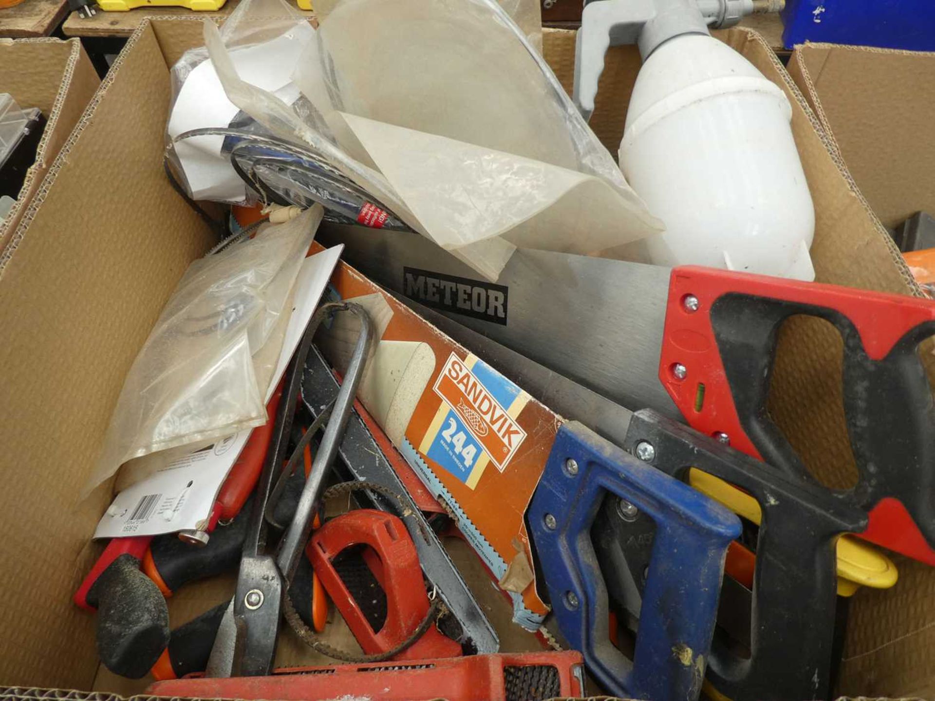 Box of tools including tin snips, surforms, band saw belts