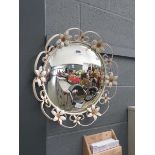 Circular convex mirror with metal floral frame