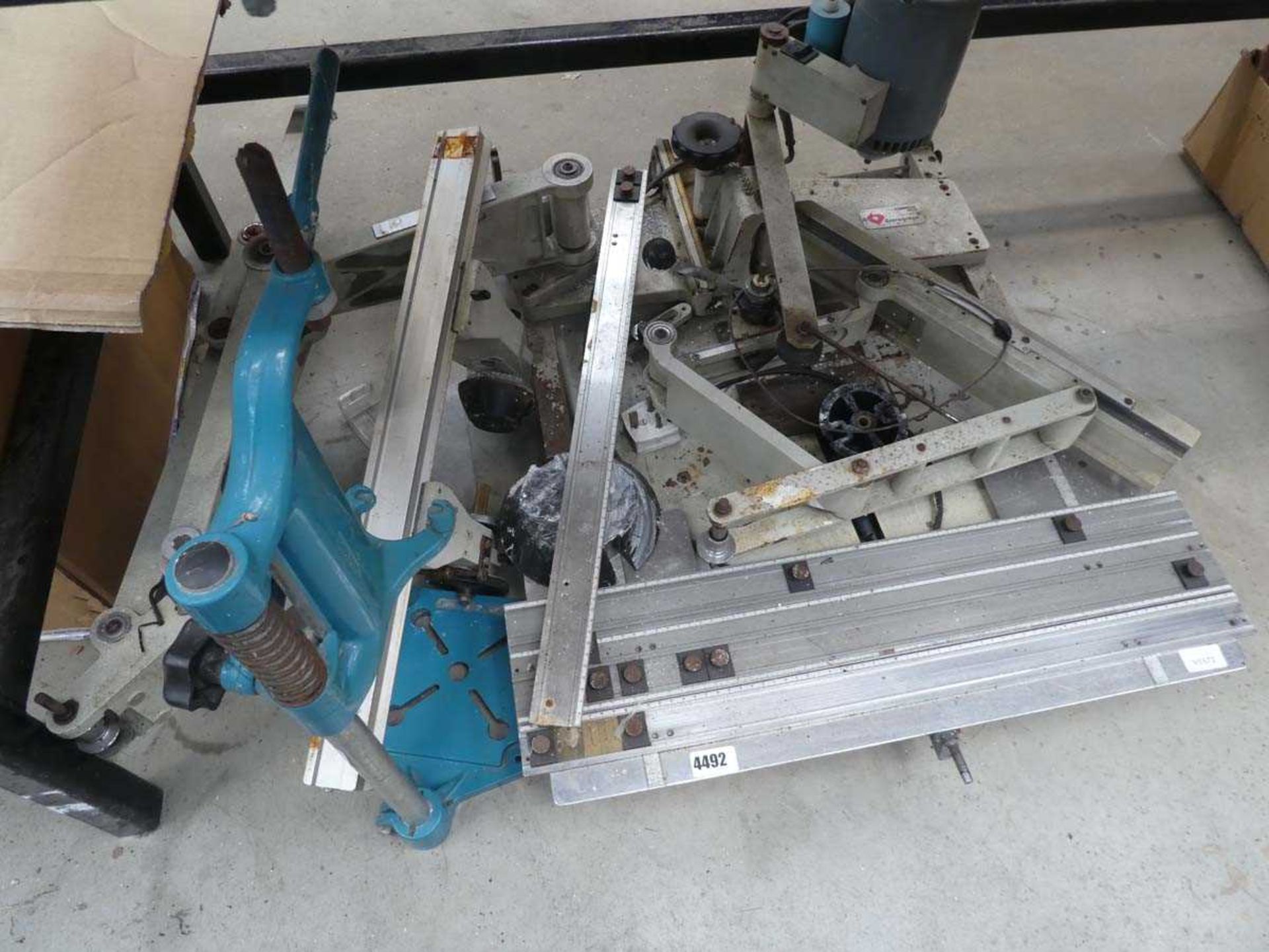 Underbay containing engraving machine and drill stand