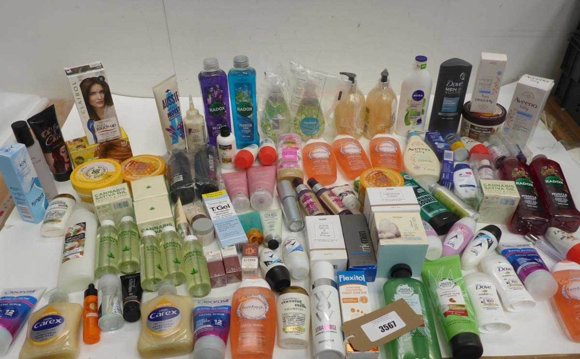 +VAT Large bag of toiletries including bath soak, body wash, hair products, foot creams, hand