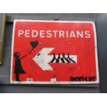 Banksy style pedestrian sign