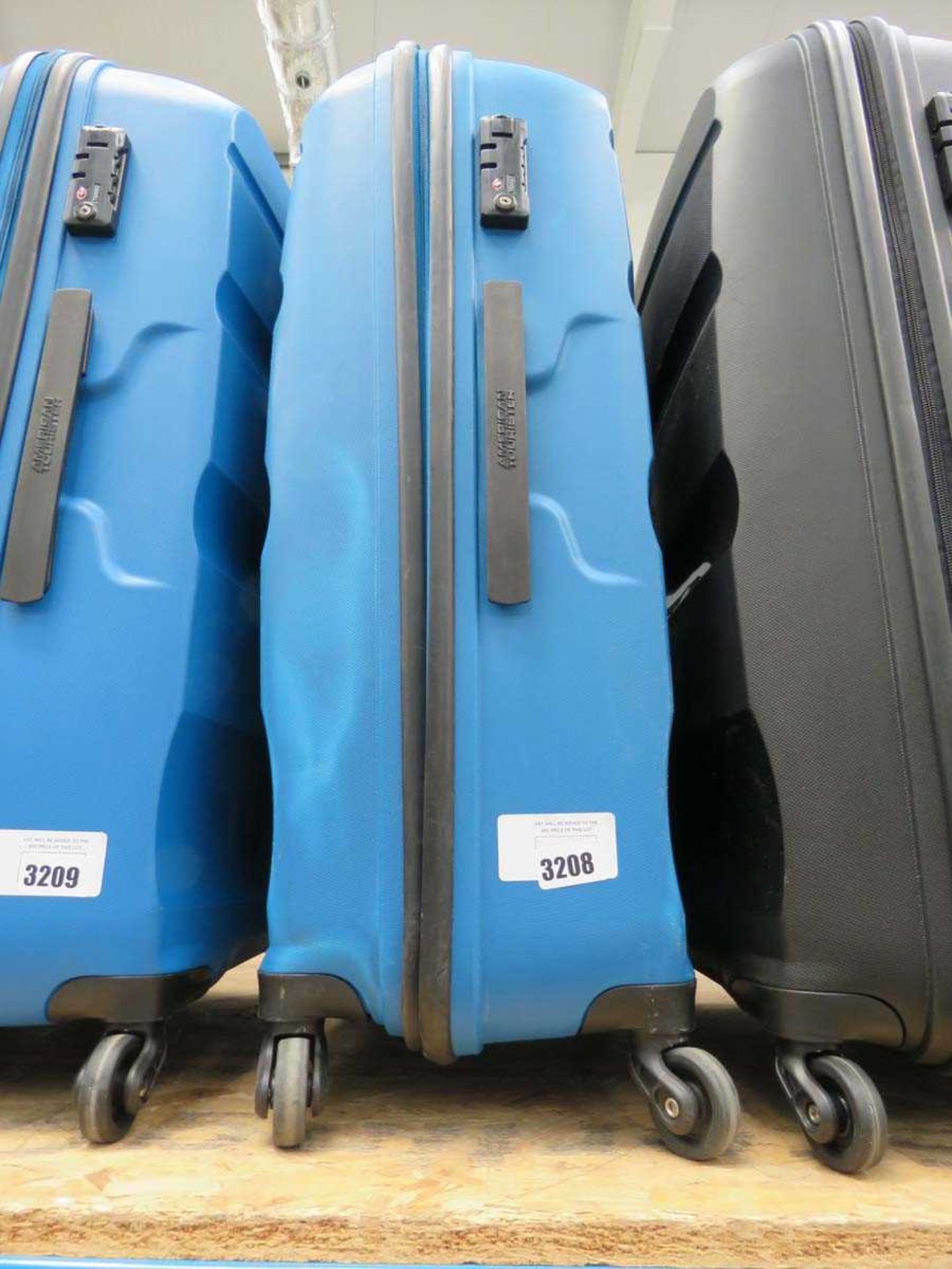 +VAT Large hardshell American Tourister suitcase