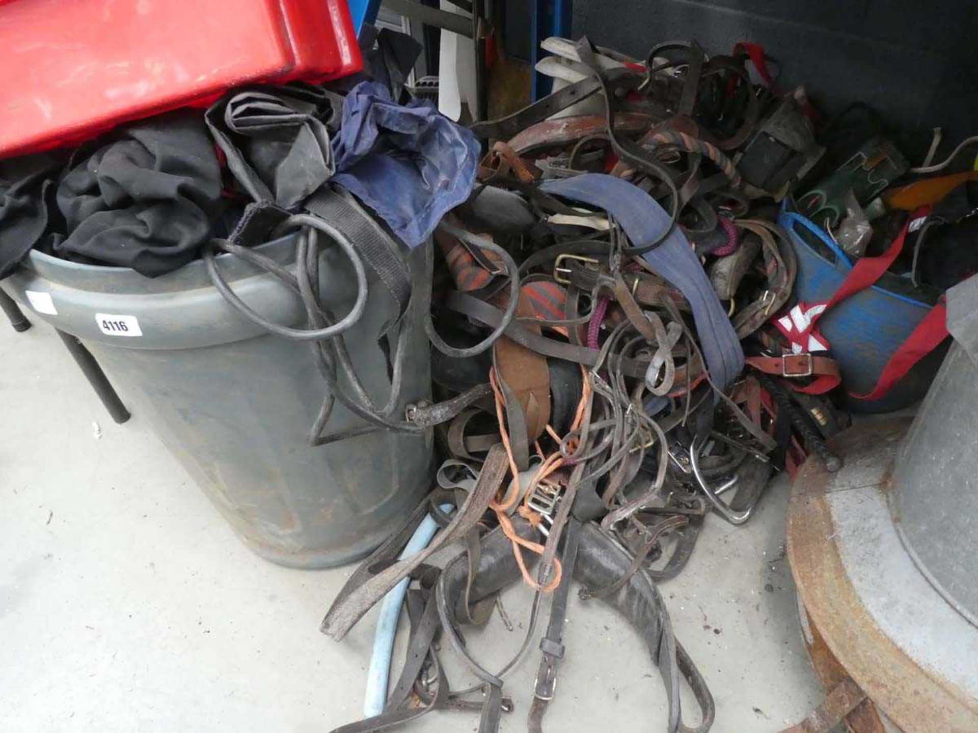 Underbay of horse tack incl. bits, clippers, straps, harnesses, etc.