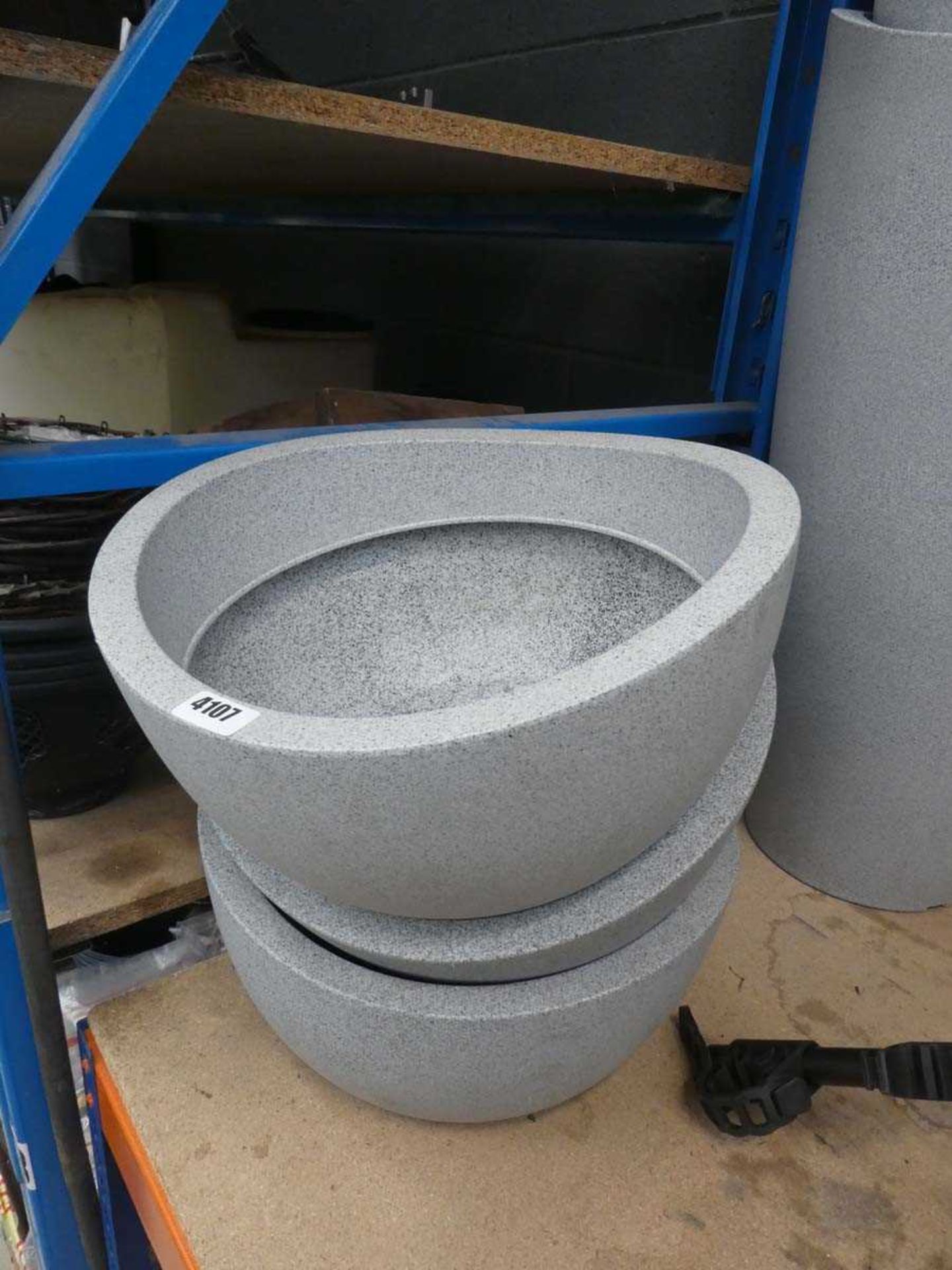 3 low grey plastic pots