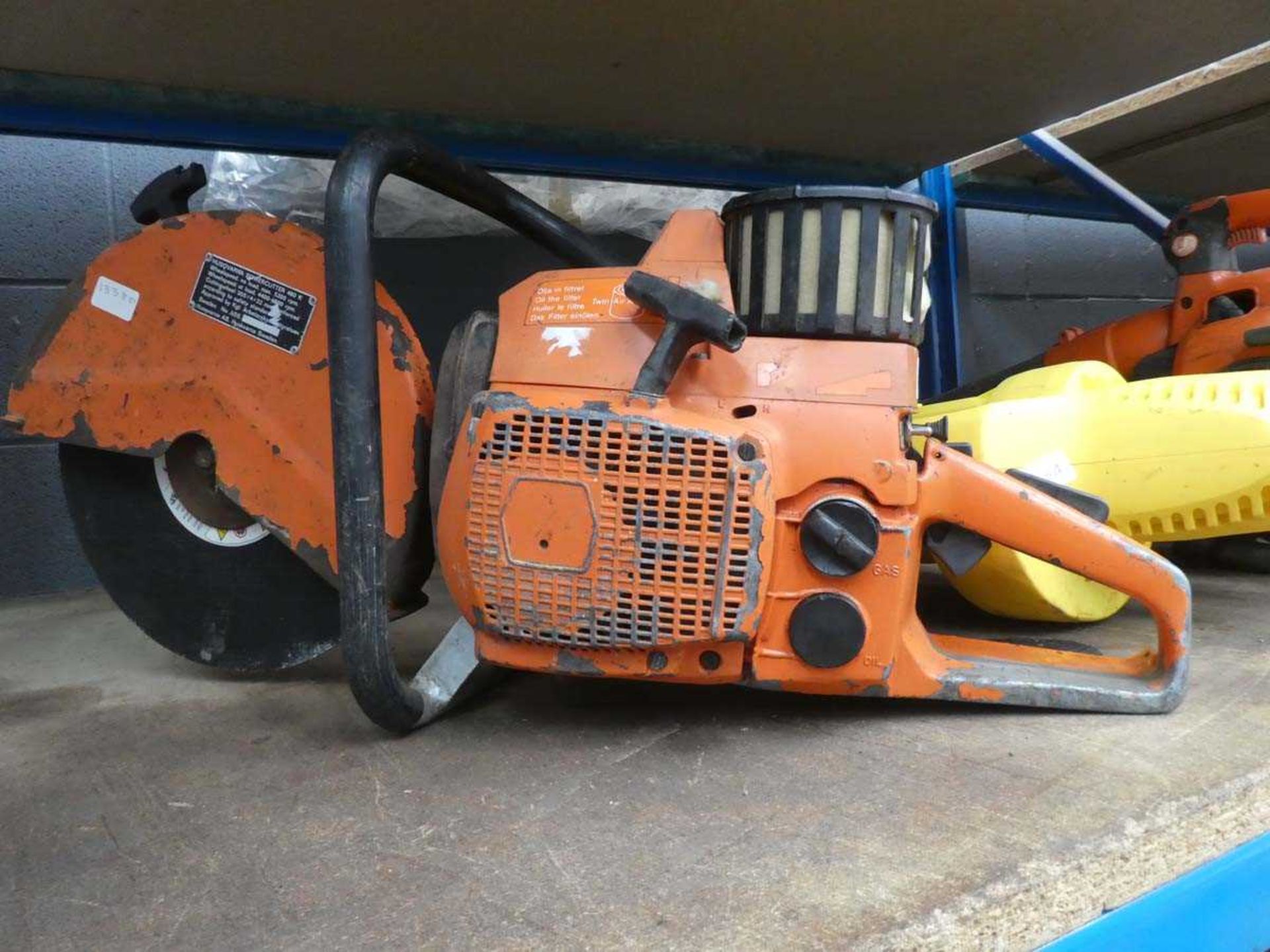 Orange petrol powered disc cutter