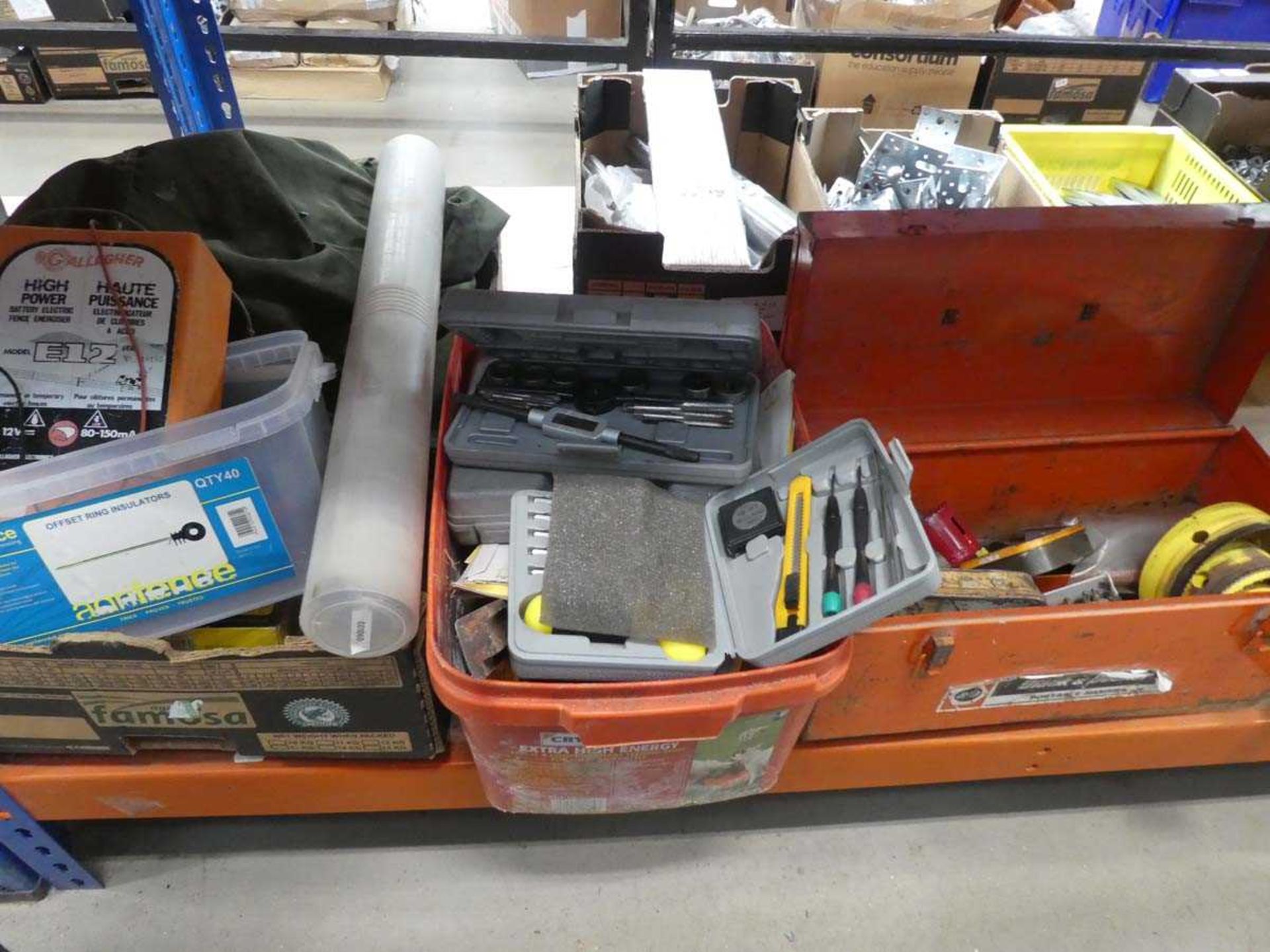 Half under bay of assorted tools incl. hole saws, screw bits, electric fence unit, screws and