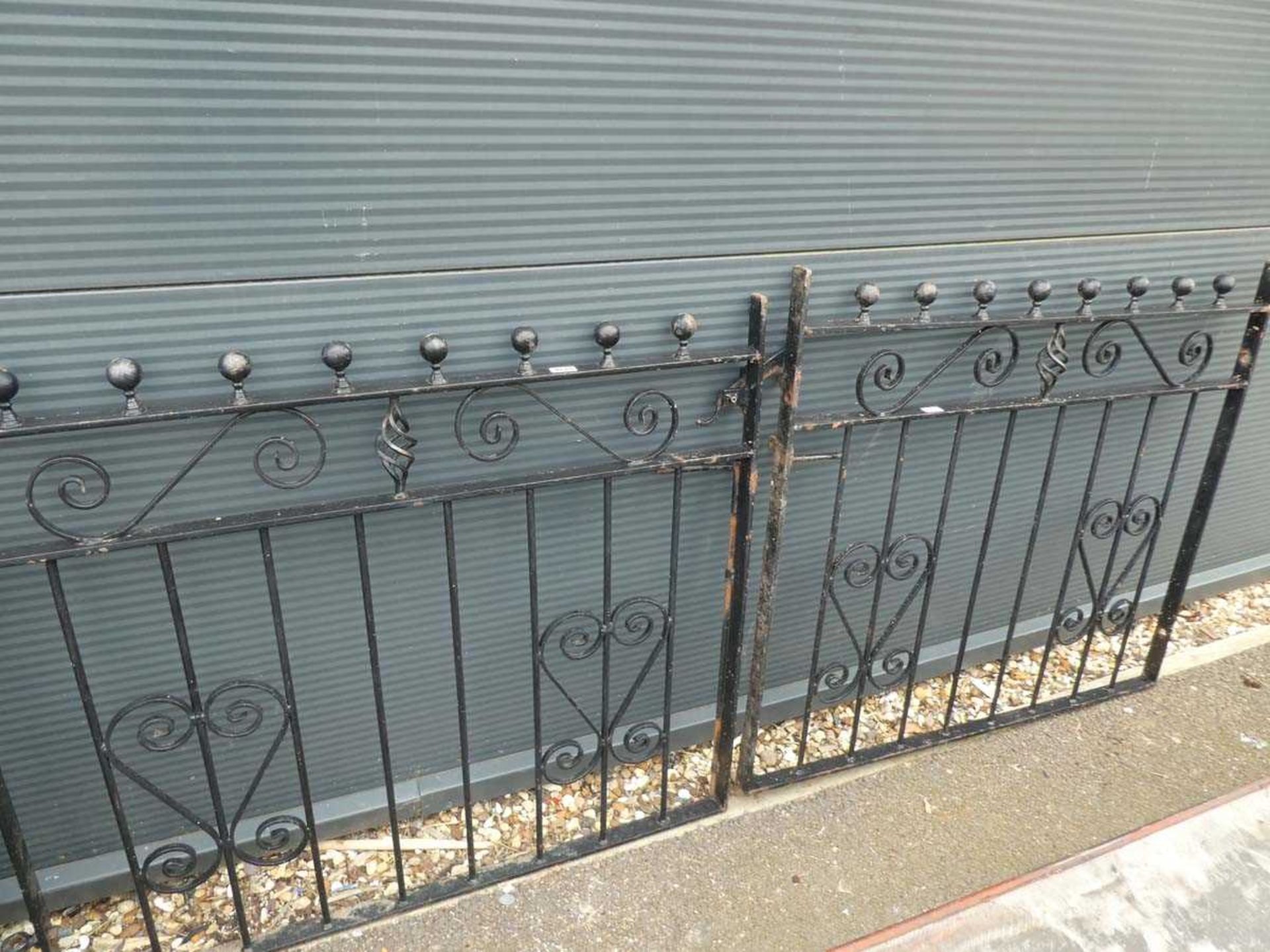 Pair of metal gates