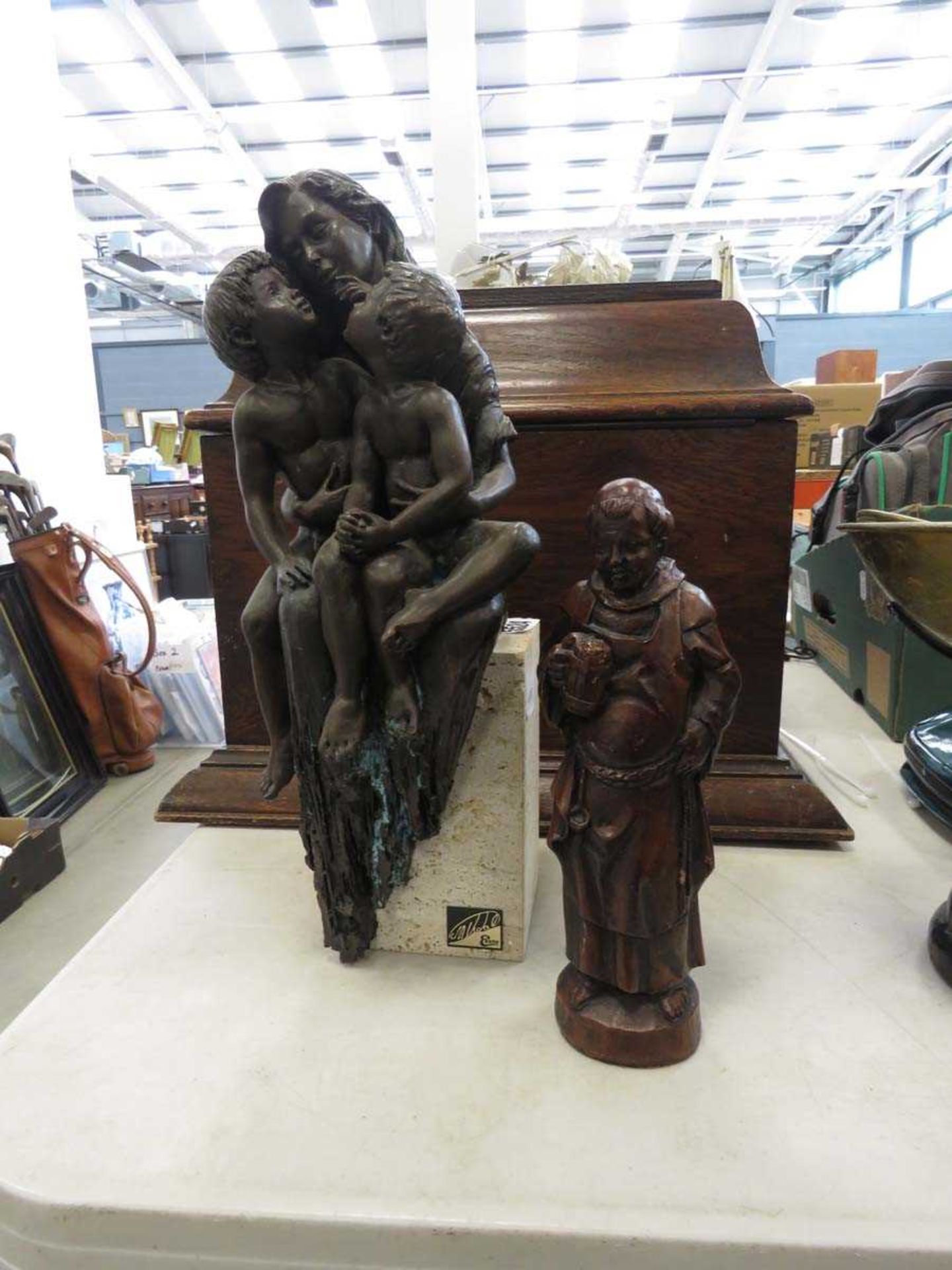Figure of mother and children plus a resin figure of a friar