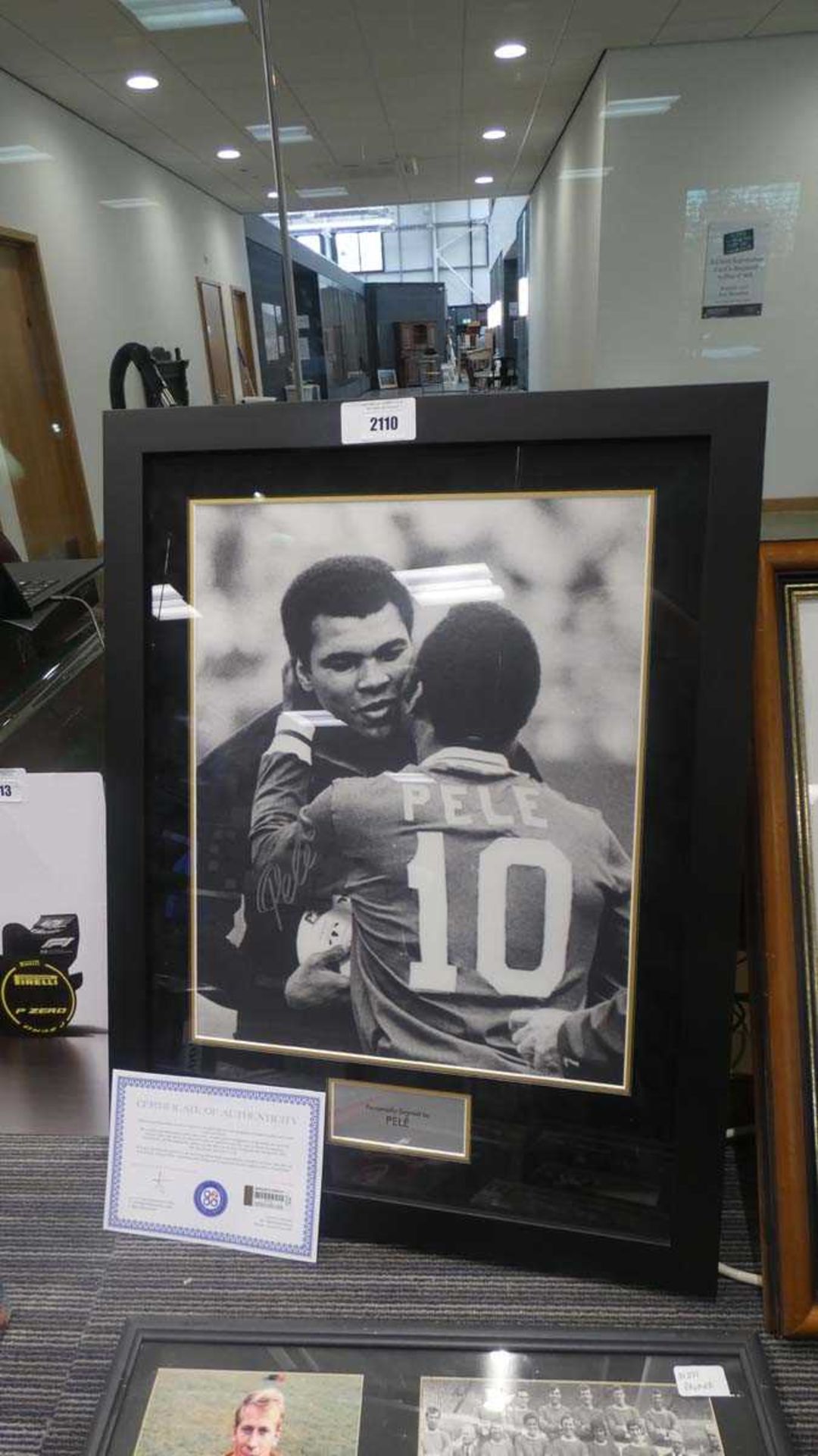 +VAT Black and white picture of Pele and Mohammed Ali bearing signature with certificate of