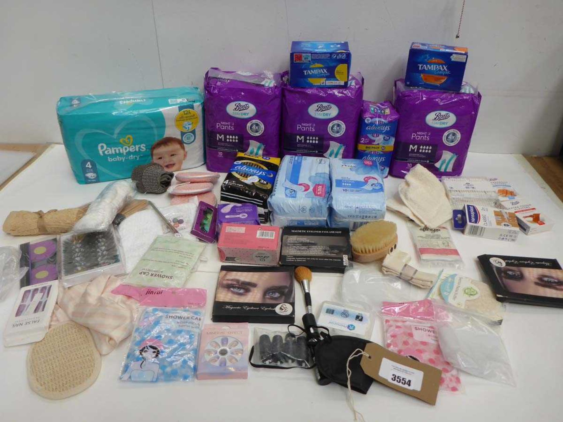 +VAT Night pants, sanitary ware, shower caps, cotton buds, plasters, false eyelashes and nails,