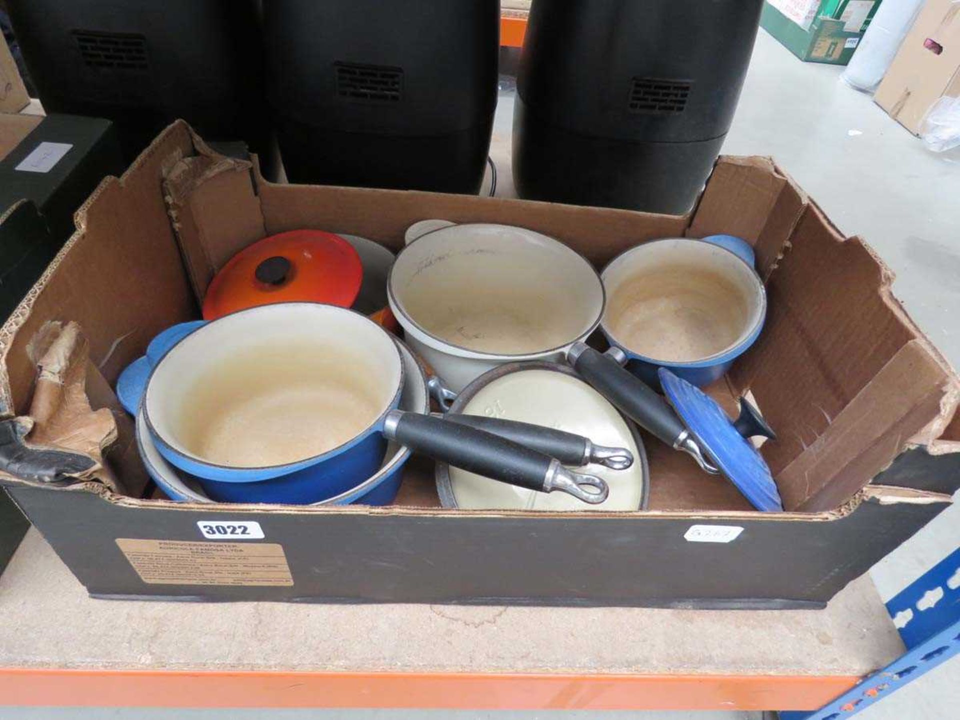 Tray of Le Creuset pots