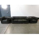 Green leather effect three seater chesterfield sofa plus a pair of matching armchairs