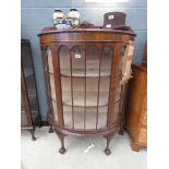 Glazed bow fronted single door china cabinet on ball and claw supports (as found)